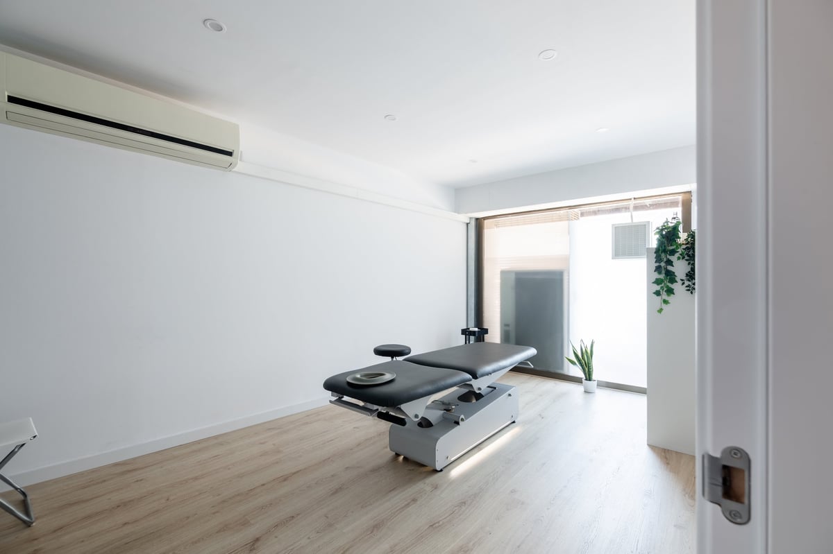 Bright, modern physiotherapy treatment room at Nexus Physiotherapy & Rehab Center